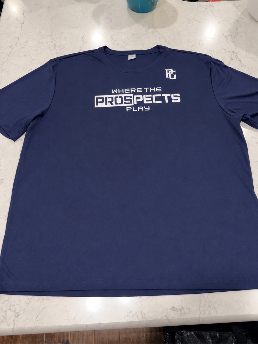 Perfect Game Navy 'Where The Prospects Play' Performance Slickly T-Shirt.
